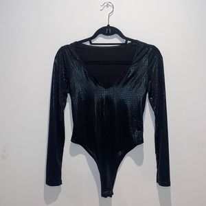 Black body suit. Small. Never warn.